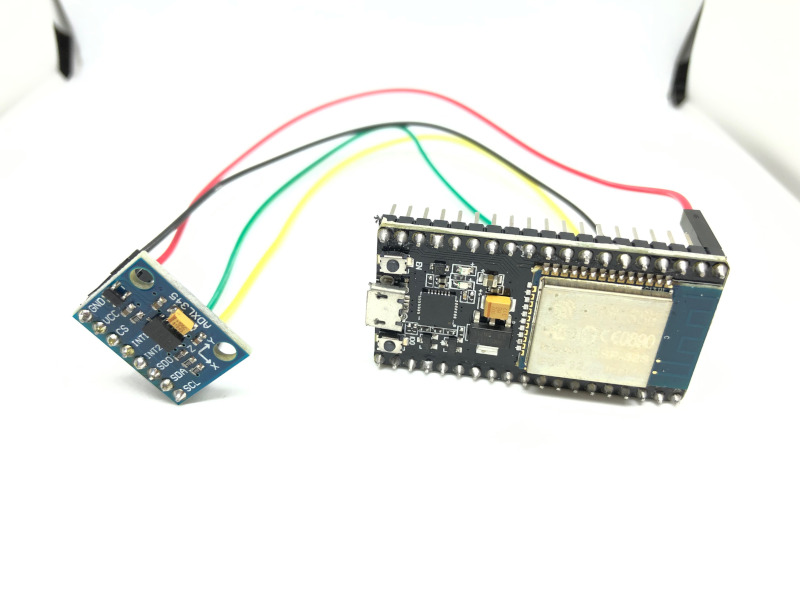 ESP32 development board connected to ADXL345 accelerometer sensor
