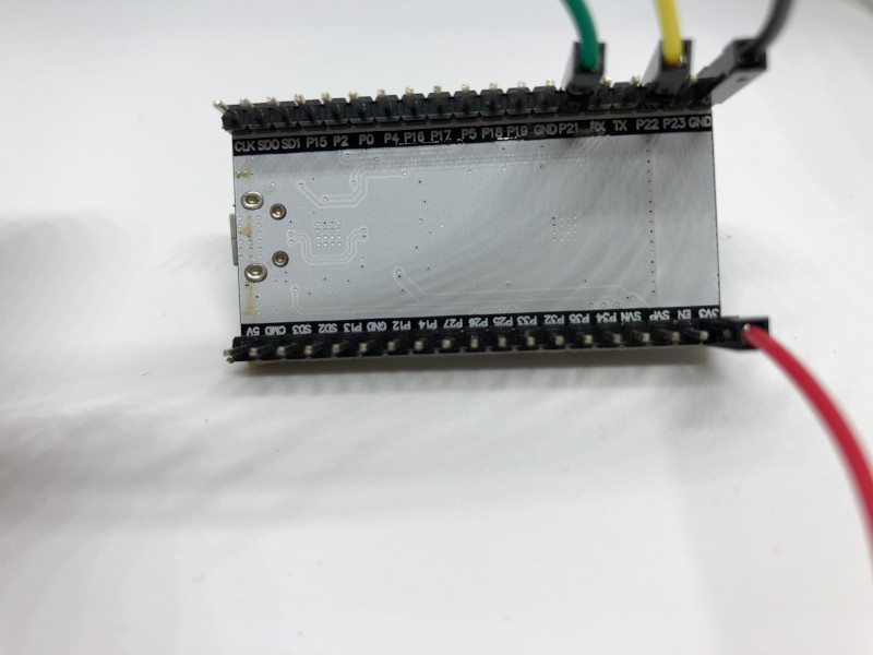 ESP32 development board with gpio wires connected to 3v3 gnd gpio21 amd gpio22 pins