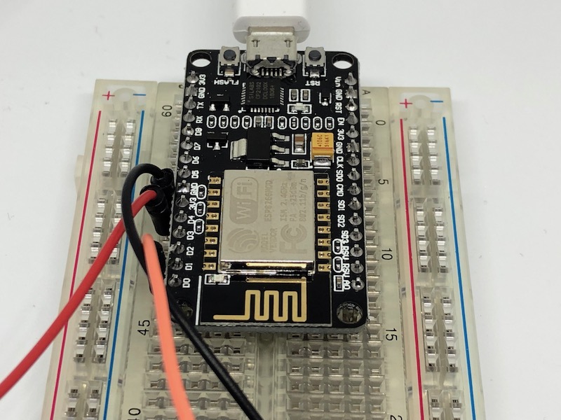 ESP8266 on breadboard with wires connected to D1 3v3 and Gnd ports
