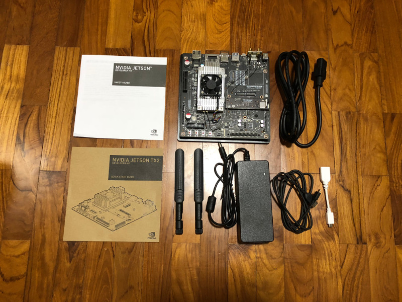 Everything inside Nvidia Jetson TX2 developer kit box laid out on floor