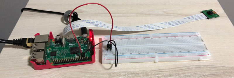 Raspberry Pi 3 connected to push button and camera module