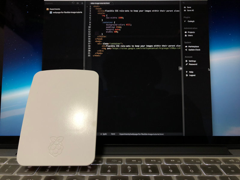 Raspberry Pi 3 with Codiad Web IDE window as the background