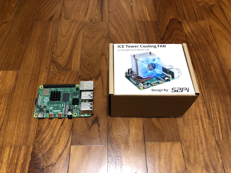 Raspberry Pi 4 Model B at the left of Ice Cooler Tower box