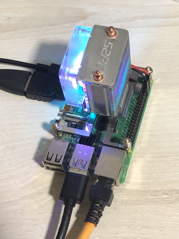Raspberry Pi 4 Model B with 2 heat sinks and ICE Tower CPU Cooling Fan during CPU stress test