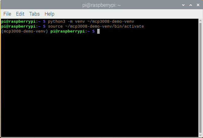 Screenshot of Raspbian terminal after creating and activating mcp3008-demo-venv
