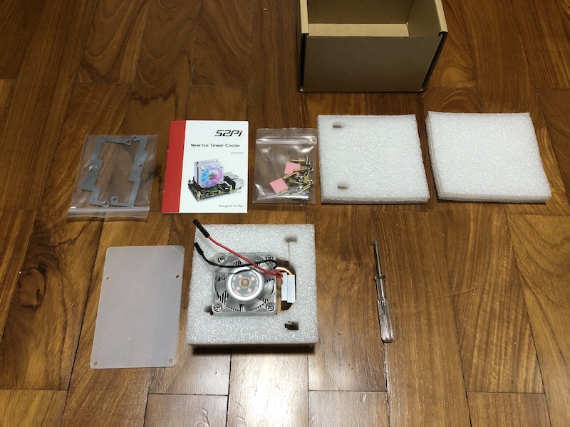 contents of ICE Tower CPU Cooling Fan laid out on the floor