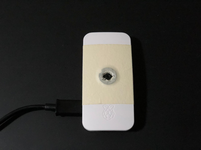 Masking tape over magnetic adapter ring and Raspberry Pi Zero W official case camera lid