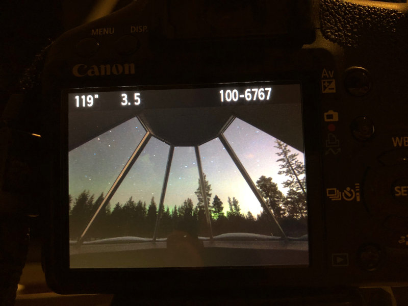 Photo of Canon 500D with photo of aurora lights at Aurora Village Ivalo